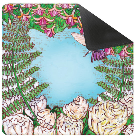 A Mahjong Mat with a colorful painting of a hummingbird in a fuchsia flower plant hovering over peony flowers painted by Deb Baker at Trail East Studio in Ada Michigan