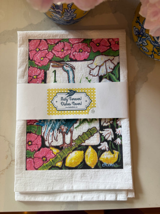 The perfect Mahjong hostess gift. A beautiful painting of a heron among flowers and lemons inspired by a vintage Bird Bam Mahjong Tile printed on a 100% cotton tea towel.