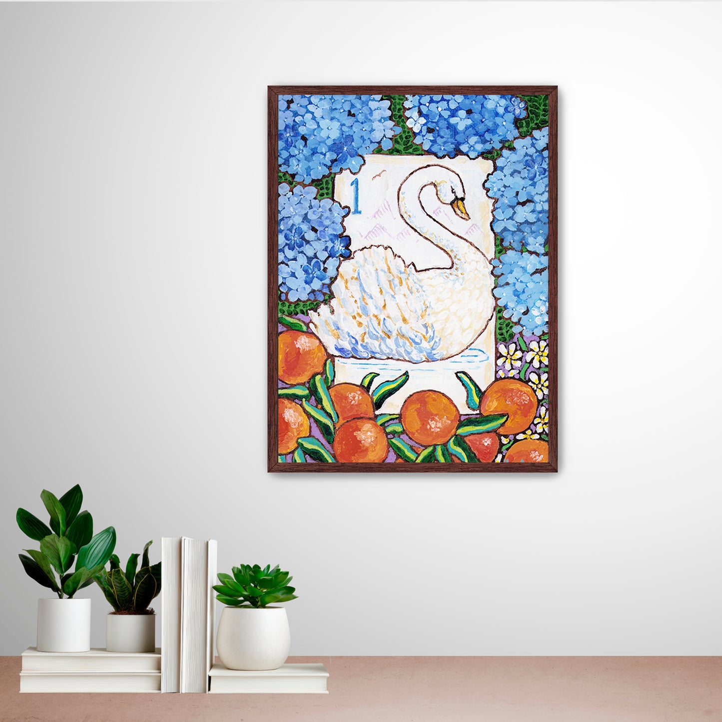 Framed artwork of a swan bird bam Mahjong tile among flowers and fruits on a wall with decorative books and plants below. This art is perfect for a Mahjong game room.