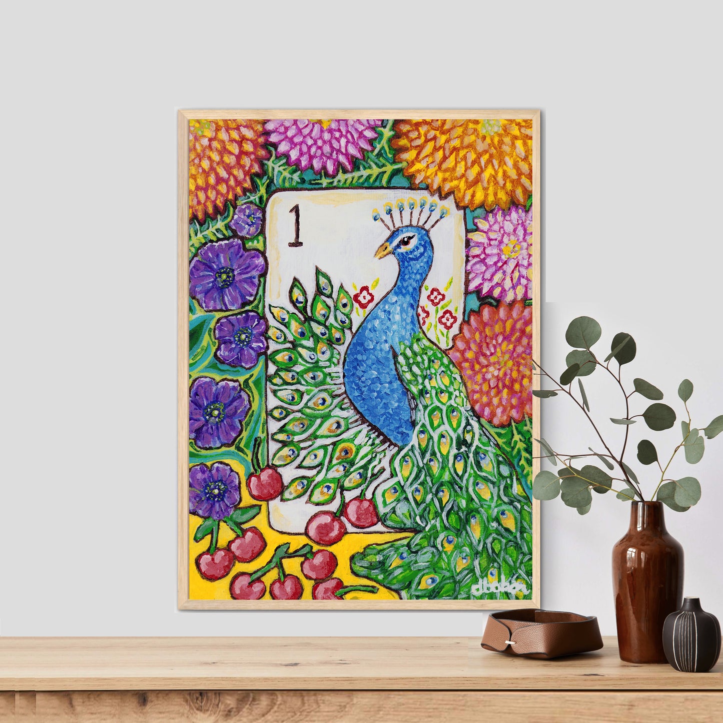 A colorful Bird Bam Mahjong Tile paintng featuring a peacock with anemone flowers, dahlia flowers and cherries. This art is perfect for a mahjong room.