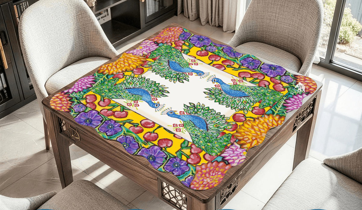 A scalloped mahjong mat featuring an original painting of peacocks, cherries, dahlias and anemones flowers.