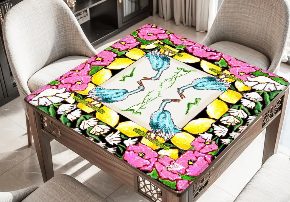 A beautiful Mahjong Mat with original art of a Heron, anemone flowers, Lilly of the valley flowers and lemons.