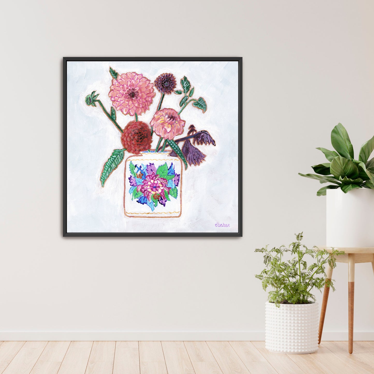 Vibrant dahlias bloom from a classic tobacco leaf vase, blending bold color, texture, and tradition in a modern still life