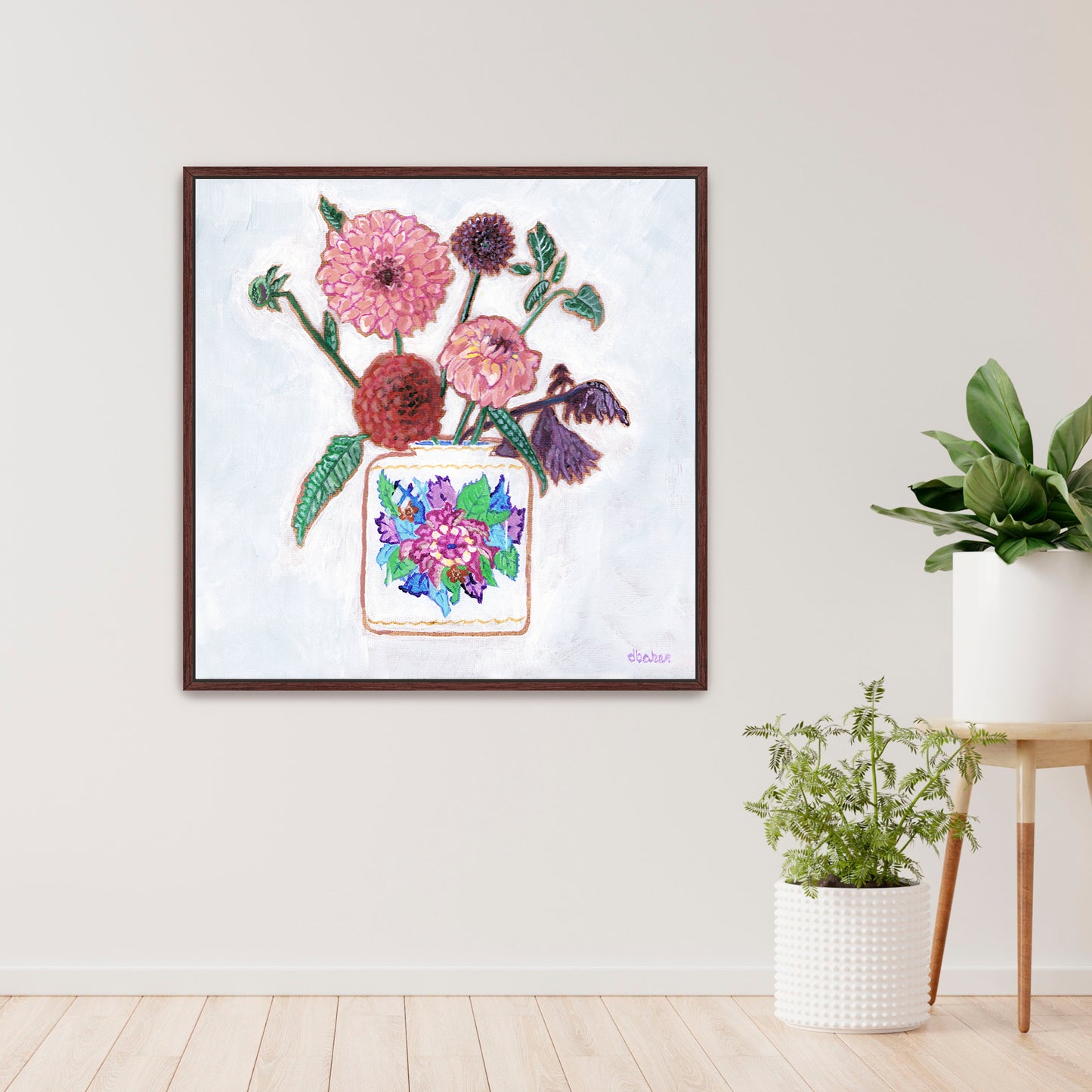 Vibrant dahlias bloom from a classic tobacco leaf vase, blending bold color, texture, and tradition in a modern still life
