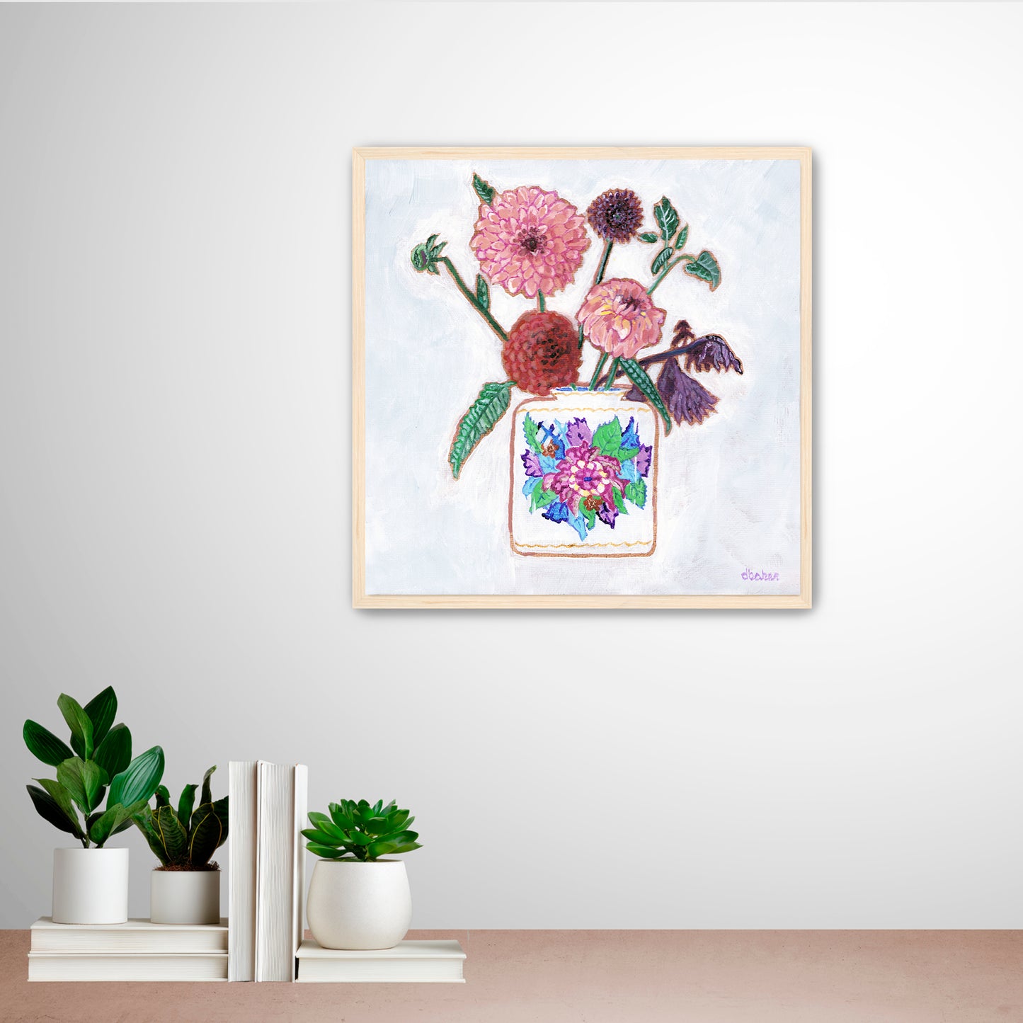 Vibrant dahlias bloom from a classic tobacco leaf vase, blending bold color, texture, and tradition in a modern still life