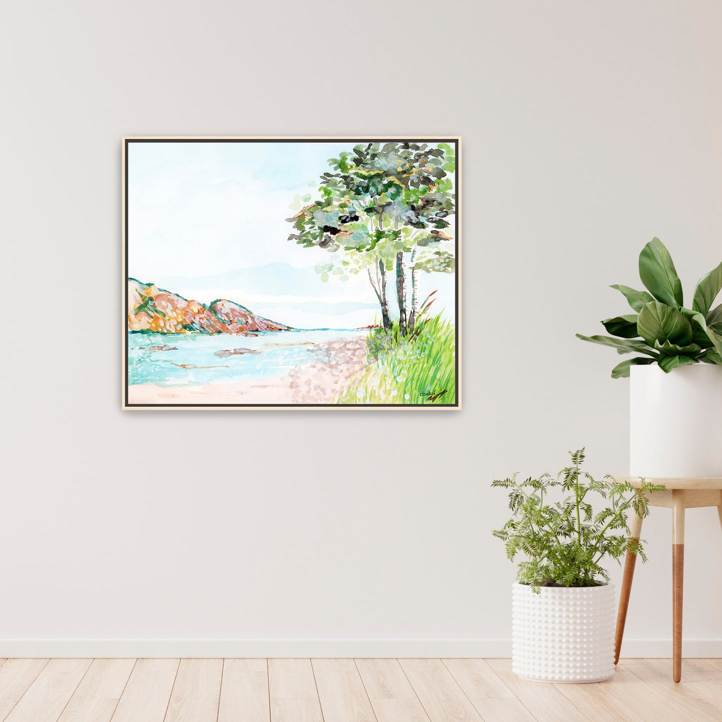 A painting that shows a stretch of beach on Lake Superior along the Porcupine Mountains in Michigan’s Upper Peninsula.