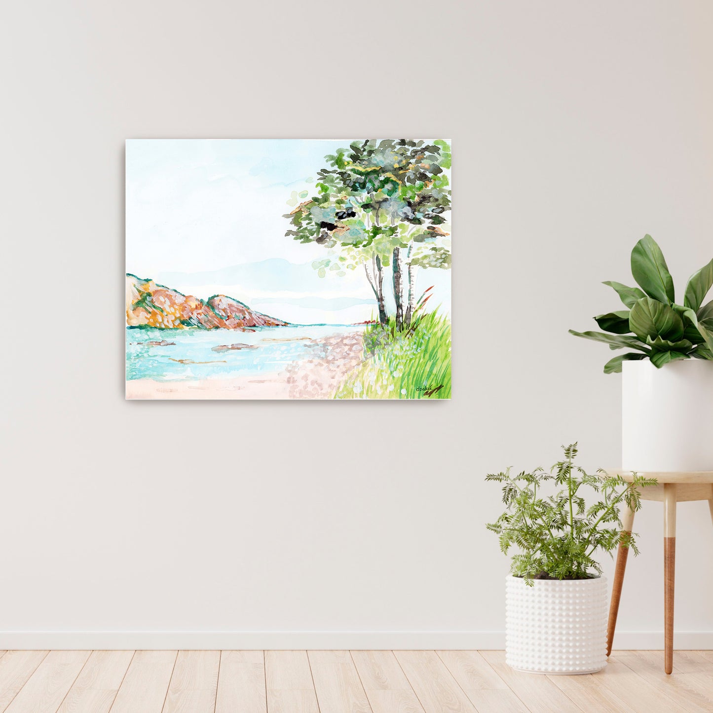 A painting that shows a stretch of beach on Lake Superior along the Porcupine Mountains in Michigan’s Upper Peninsula.