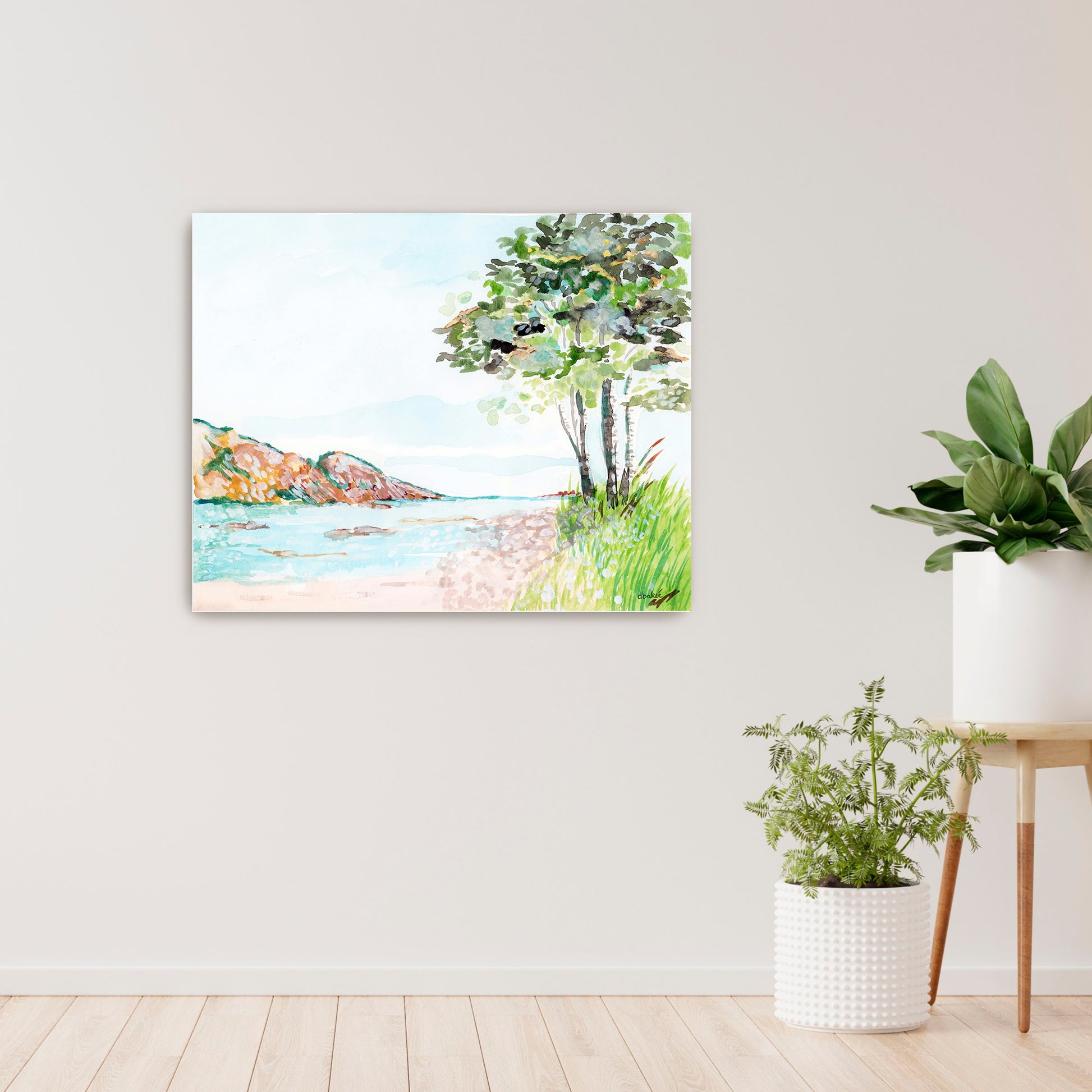 A painting that shows a stretch of beach on Lake Superior along the Porcupine Mountains in Michigan’s Upper Peninsula.