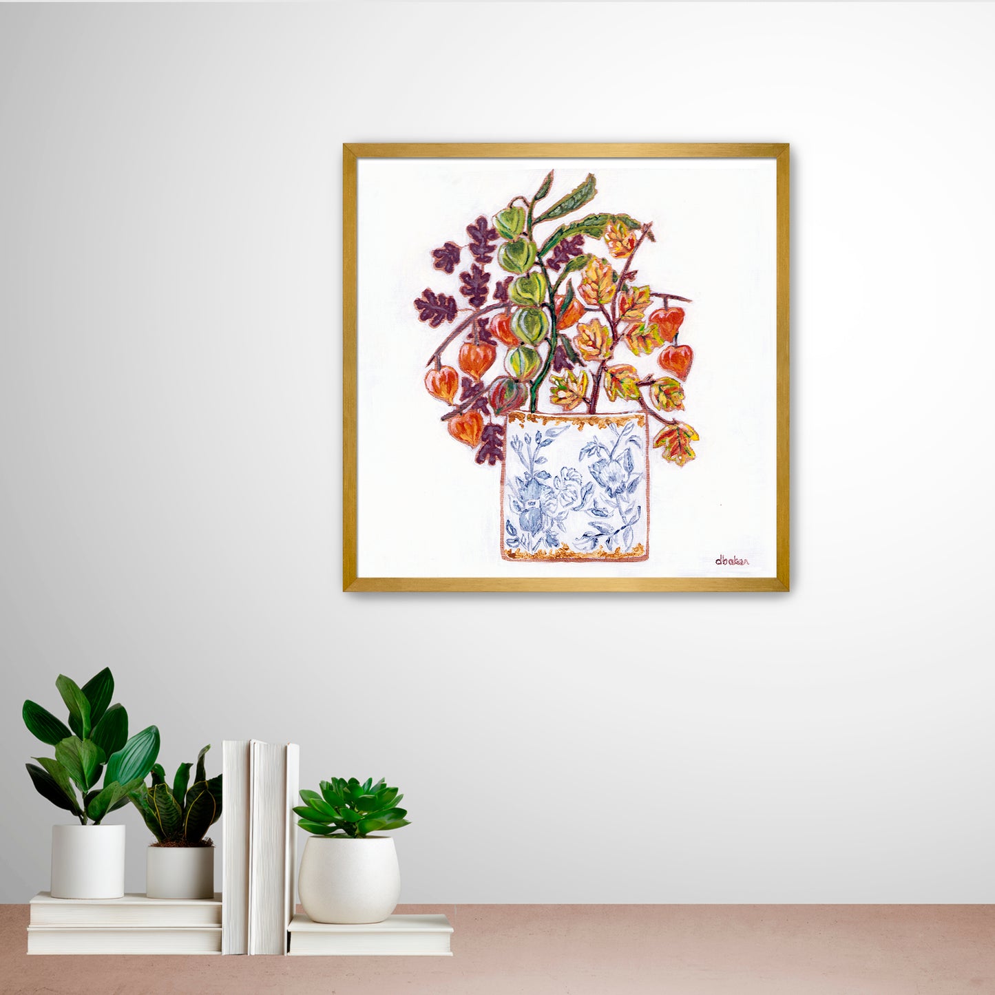 A delicate still life featuring vibrant orange and green lantern flowers arranged in a blue-and-white porcelain vase.