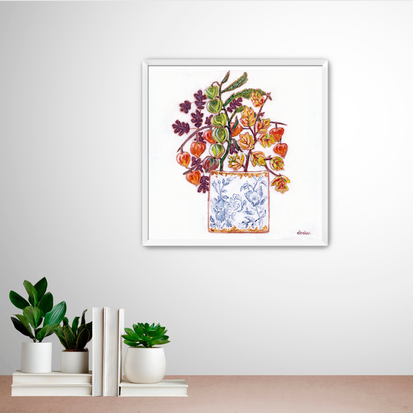 A delicate still life featuring vibrant orange and green lantern flowers arranged in a blue-and-white porcelain vase.