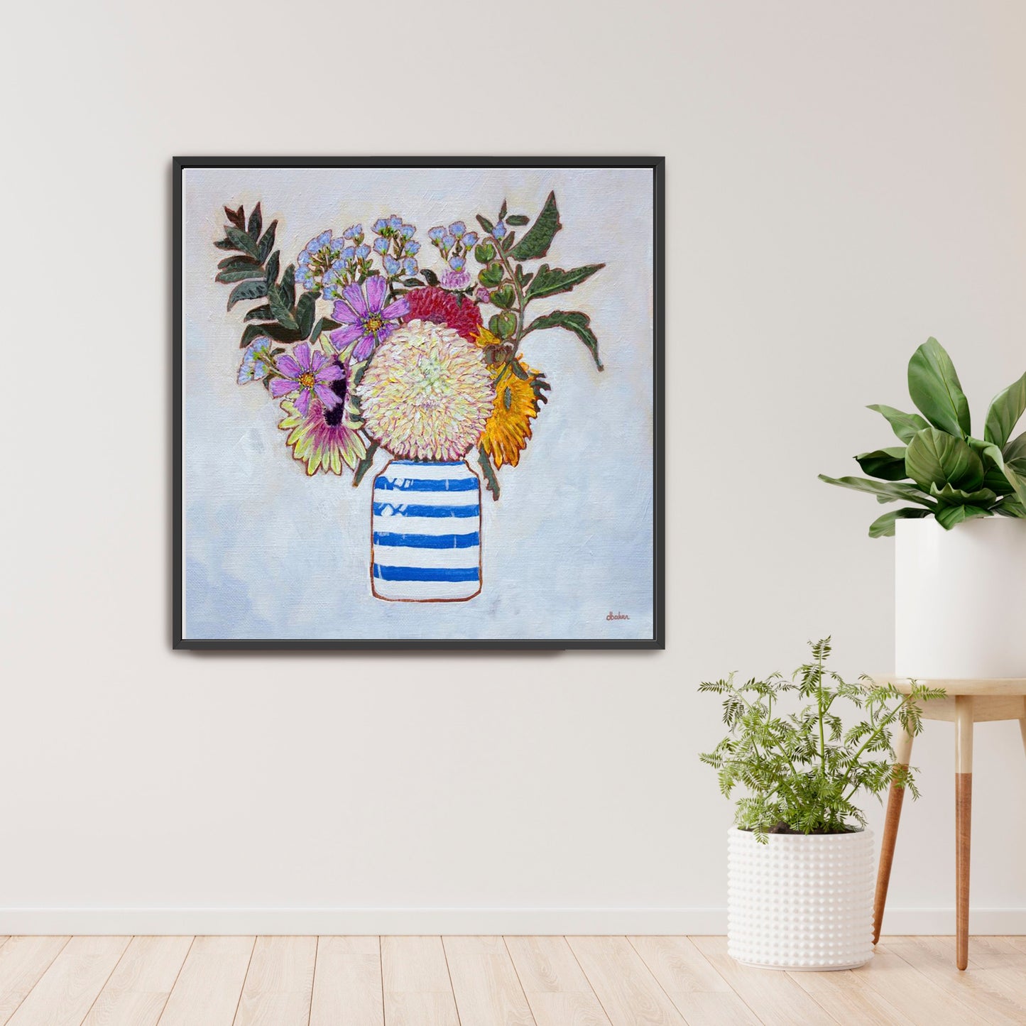 A whimsical and colorful painting of dahlias and wildflowers in a blue and white striped vase.
