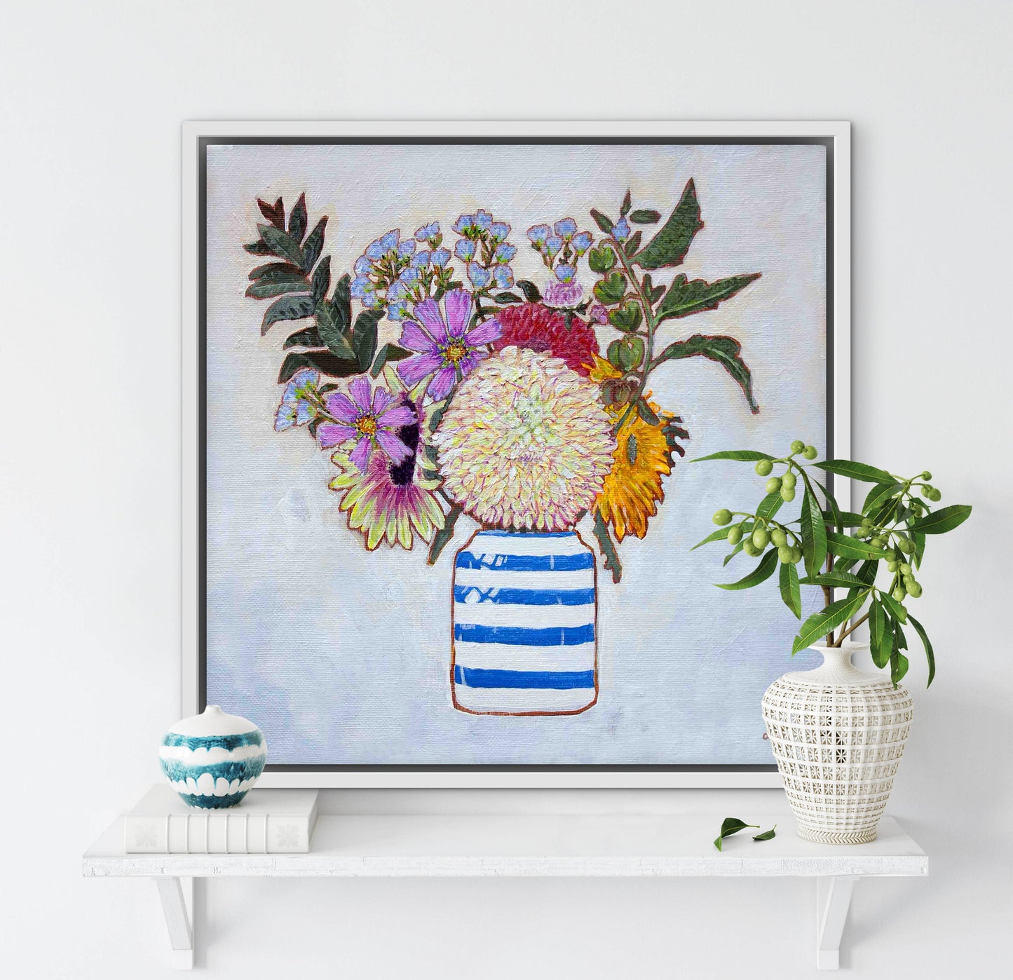 A whimsical and colorful painting of dahlias and wildflowers in a blue and white striped vase.