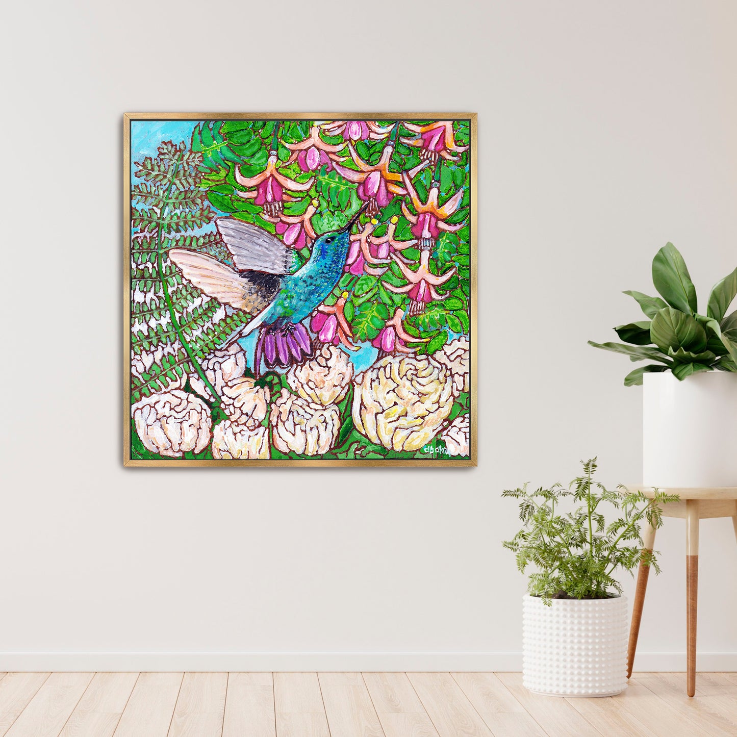 A colorful painting of a hummingbird in a fuchsia flower plant hovering over peony flowers.