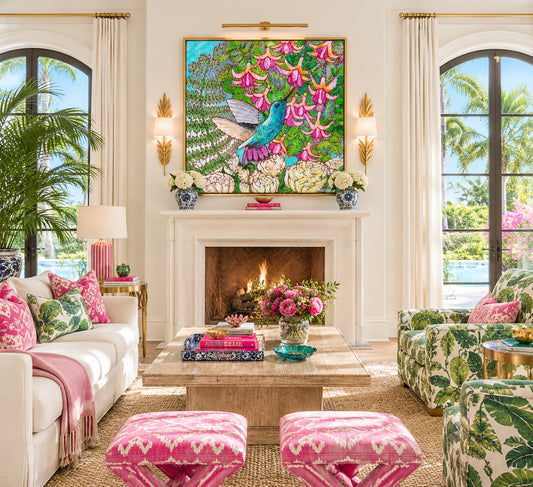 A colorful painting of a hummingbird in a fuchsia flower plant hovering over peony flowers by Deb Baker of Trail East Studio in Ada Michigan