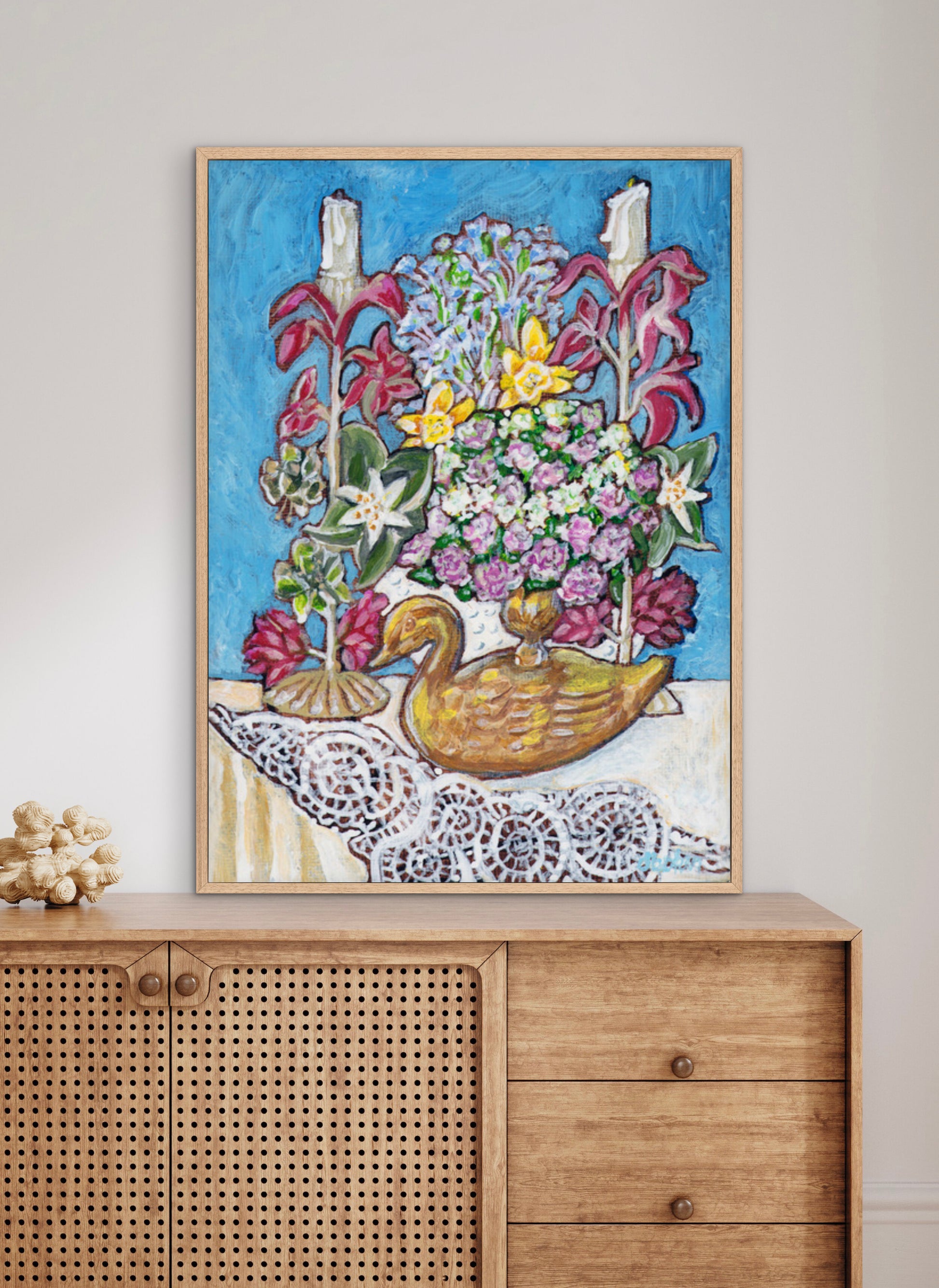 A painting from Trail East Studio of antique tole candleholders and an antique swan candleholder filled with flowers on a crocheted lace tablecloth