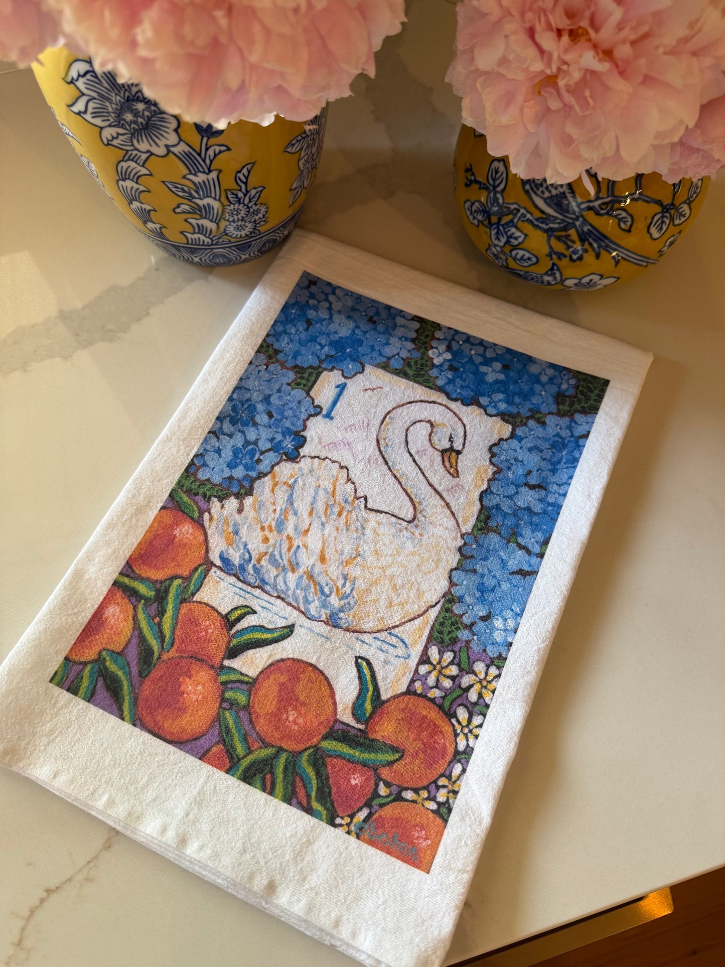The perfect Mahjong hostess gift. A beautiful painting  of a swan among hydrangeas and oranges inspired by a vintage Bird Bam Mahjong Tile printed on a 100% cotton tea towel.