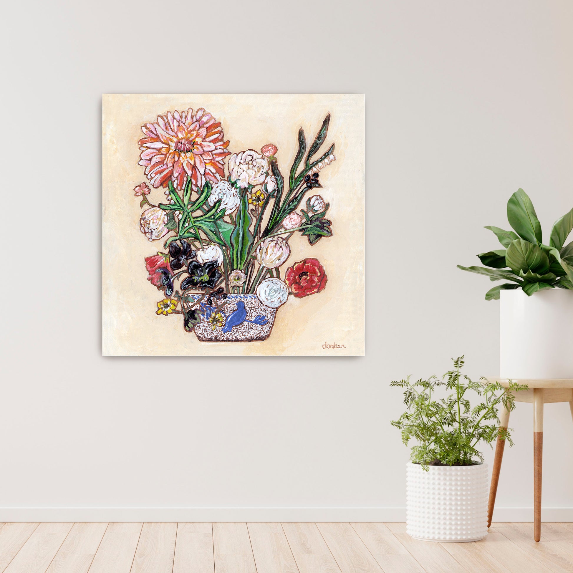 A painting of a colorful flowers including a large dahlia  in a blue and white bird vase.