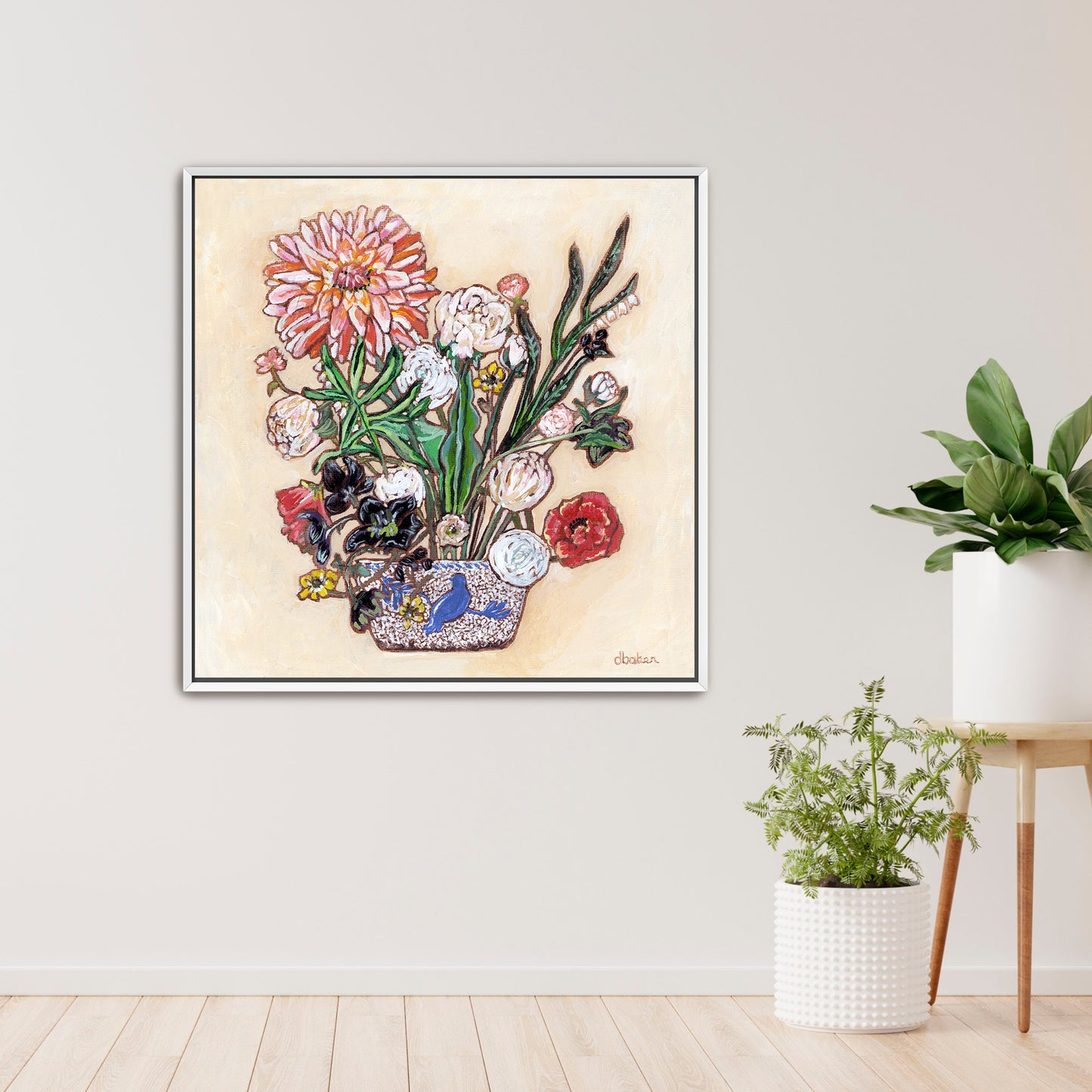 A painting of a colorful flowers including a large dahlia  in a blue and white bird vase.