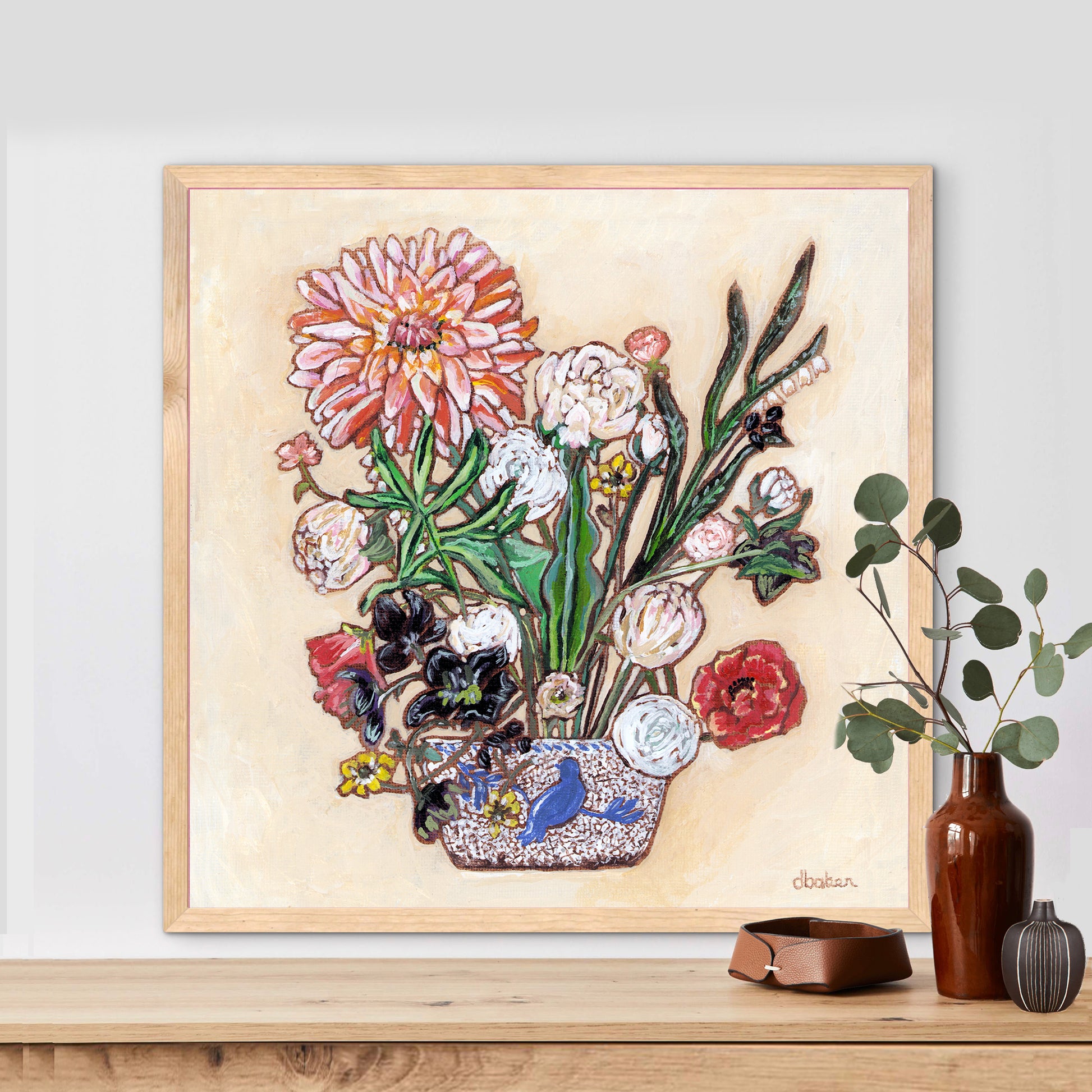 A painting of a colorful flowers including a large dahlia  in a blue and white bird vase.