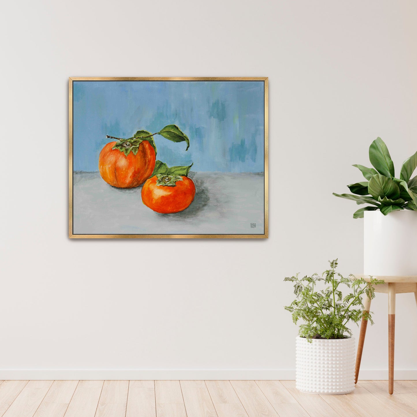 A beautiful  oil painting of two persimmons on a blue wall.