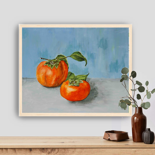 A beautiful  oil painting of two persimmons on a blue wall.
