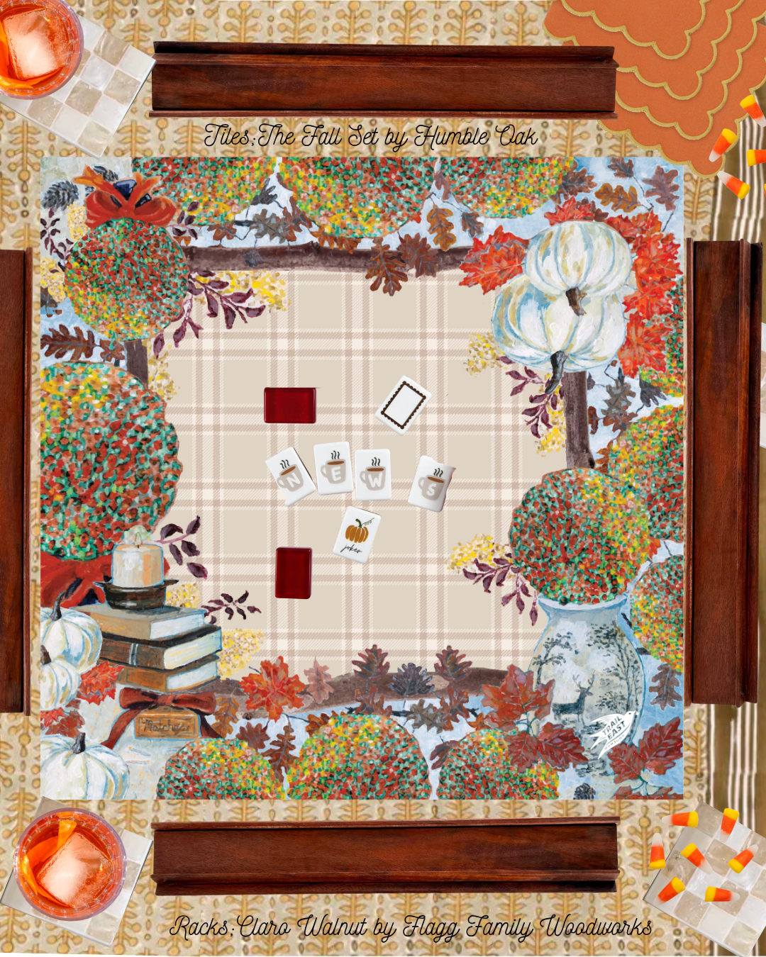 The Original Painting Cozy Fall Mahjong Mat by Trail East Studio. A colorful fall illustrations of pumpkins, leaves, mums, books and a lit candle.