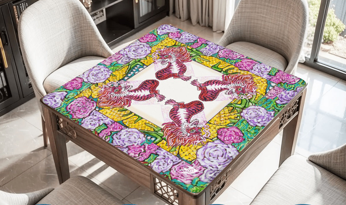 A beautiful and colorful mahjong mat featuring a red dragon with roses and pineapples.