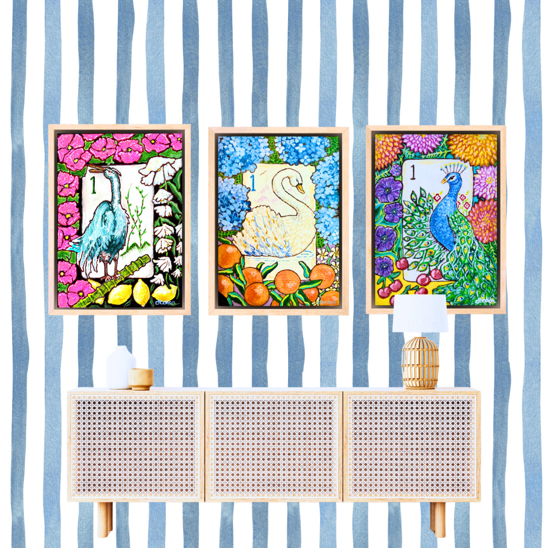 A set of three colorful paintings of vintage Bird Bam Mahjong Tiles featuring a heron, a swan and a peacock surrounded  by flowers.