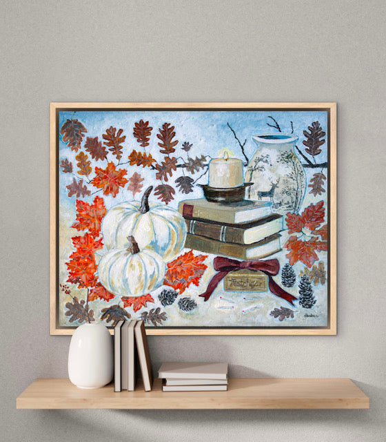 A painting of a cozy autumn still life featuring white pumpkins, vintage books, a red velvet bow and warm fall leaves. A perfect rustic accent for your home decor.