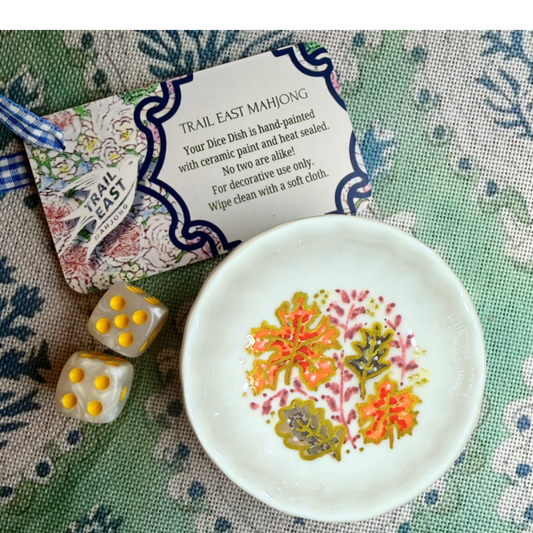 A hand painted mahjong dice dish featuring Fall Leaves from Trail East Studio in Ada Michigan