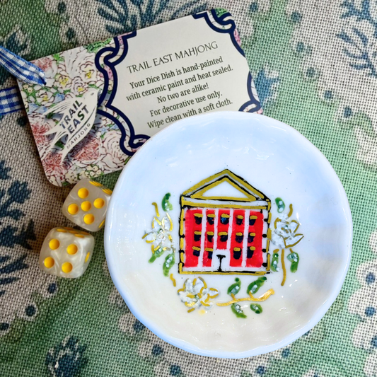 A hand painted mahjong dice dish featuring an Ole Miss motif from Trail East Studio in Ada Michigan