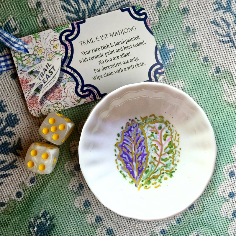 A hand painted Mahjong disco dish featuring pink, green and purple cabbage leaves by Trail East Studio in Ada Michigan