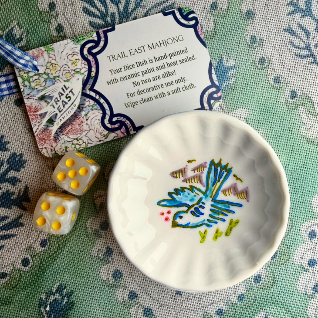 A hand painted Mahjong Dice Dish with vintage bird bam motif from Trail East Studio. The perfect hostess gift.