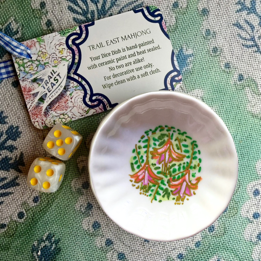 A hand painted mahjong dice dish featuring fuchsia flowers by Trail East Studio in Ada Michigan