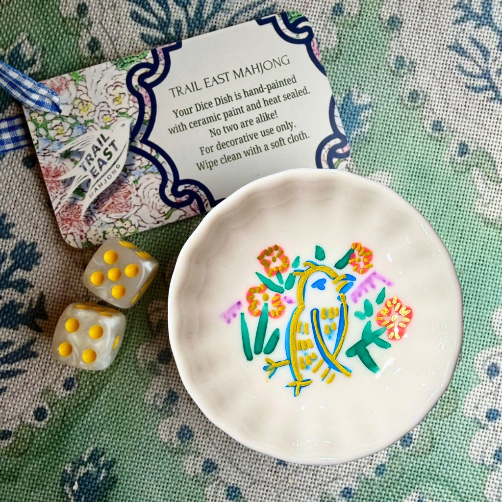 A hand painted Mahjong Dice Dish with vintage bird bam motif from Trail East Studio. The perfect hostess gift.