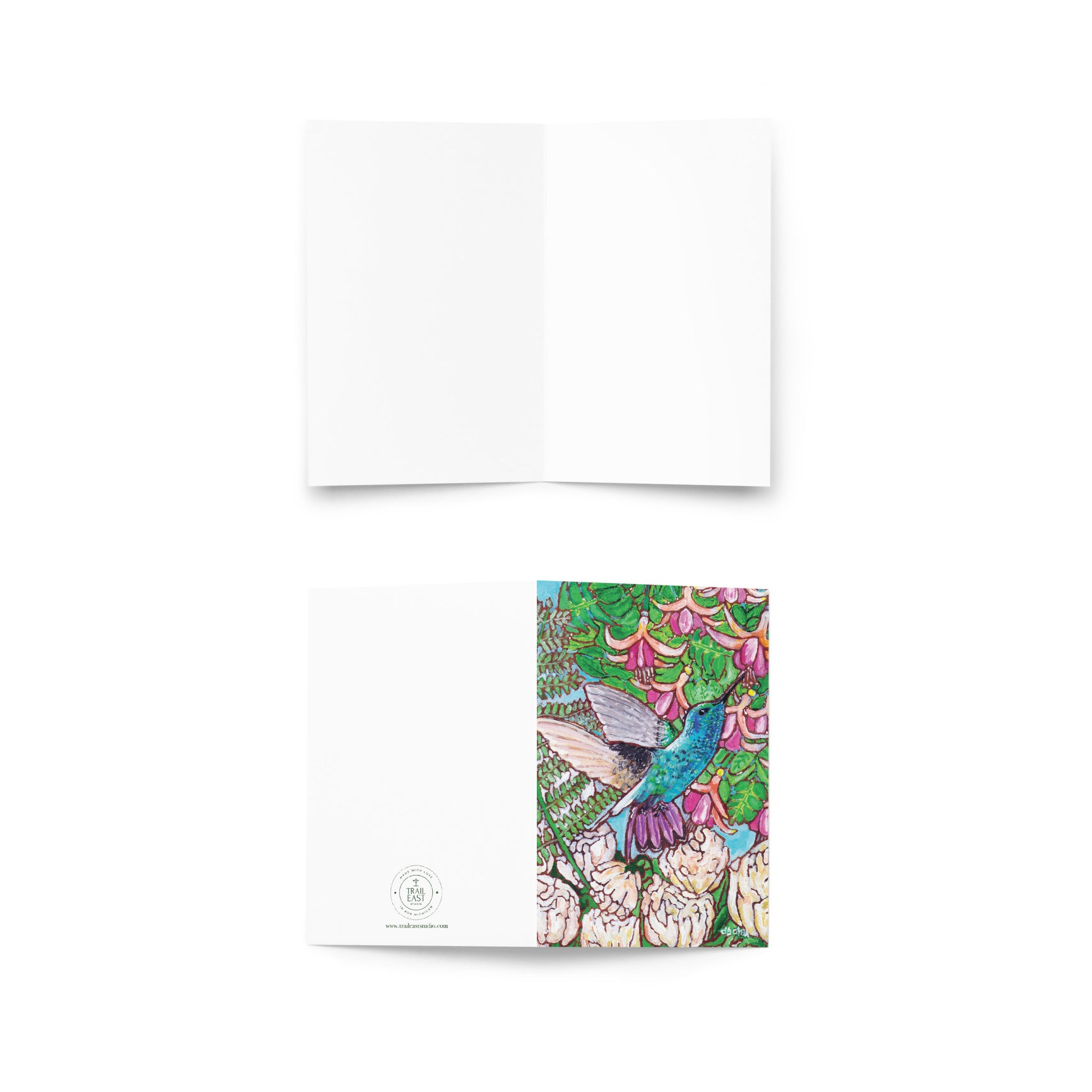 A greeting card from Trail East Studio featuring a painting of a hummingbird with peonies and fuchsia flowers